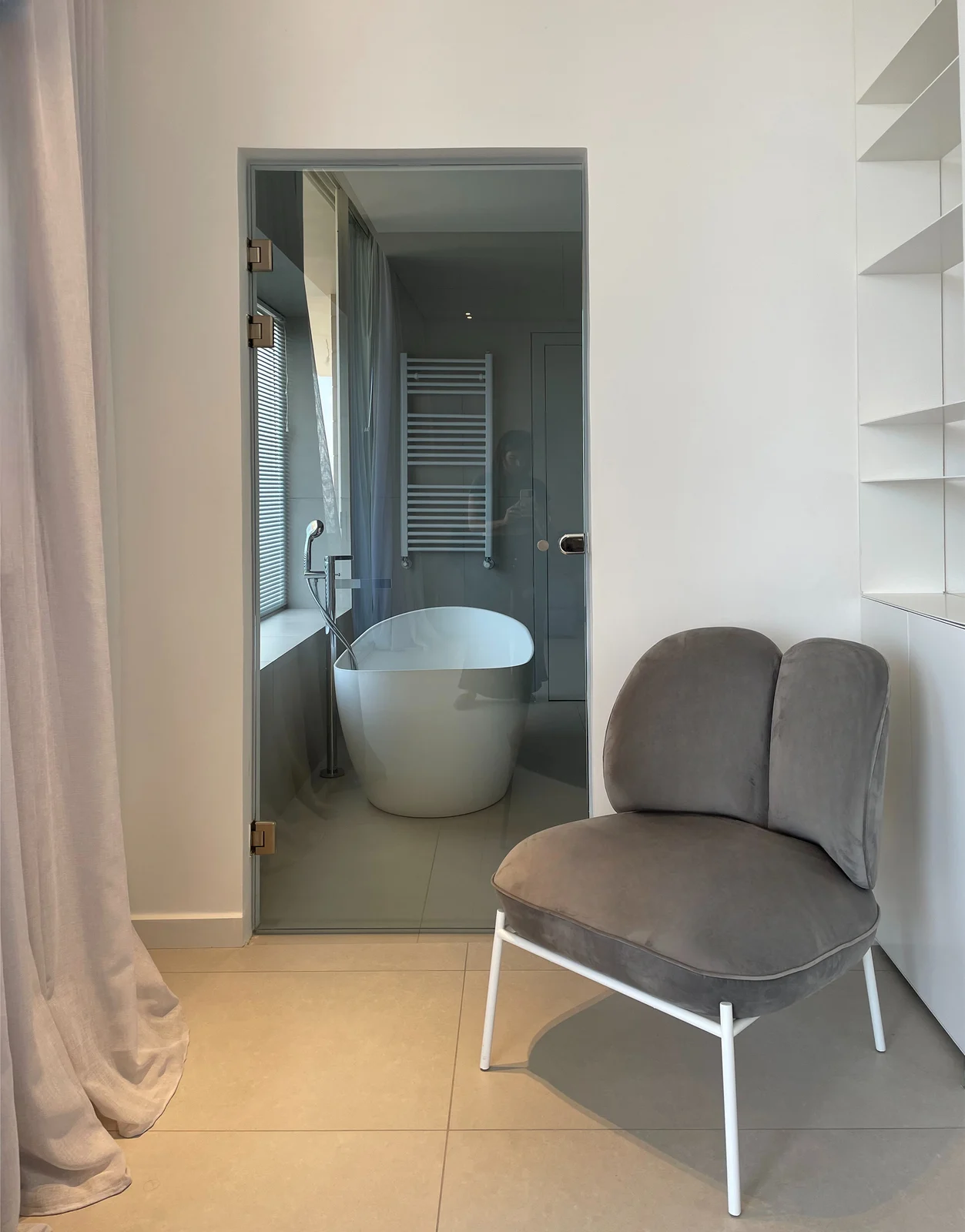 Bedroom seating beside the bathroom