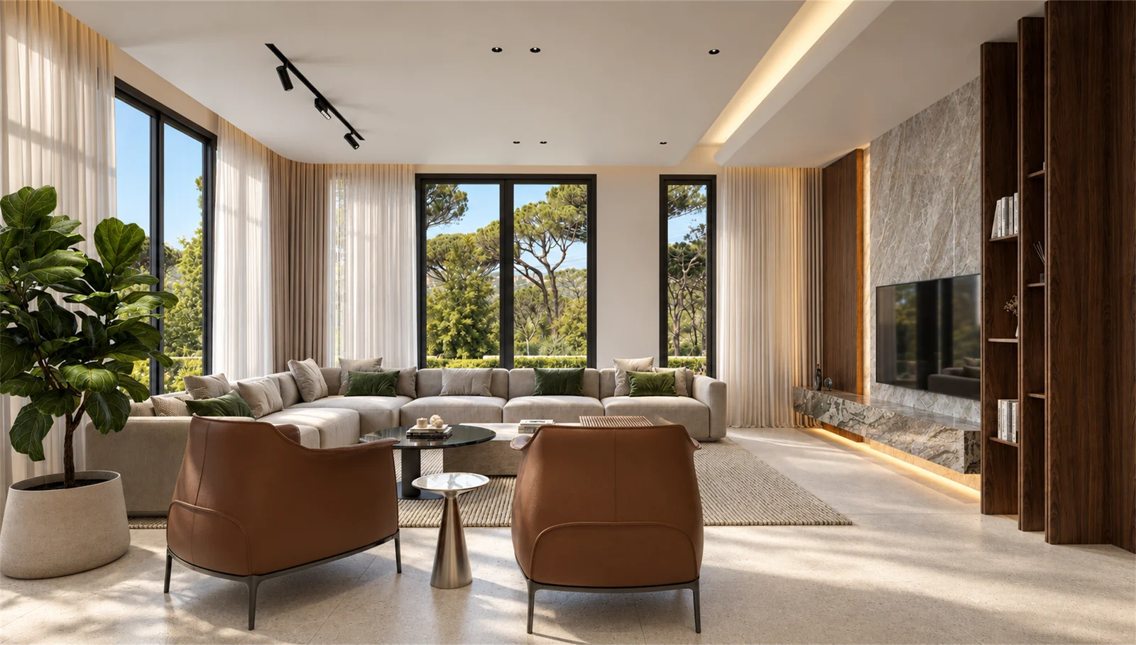 Sunlit living room with cognac-toned armchairs and views of the surrounding trees