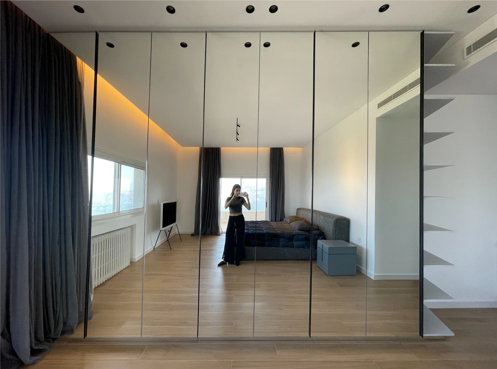 Mirrored wardrobes & bedroom reflections
