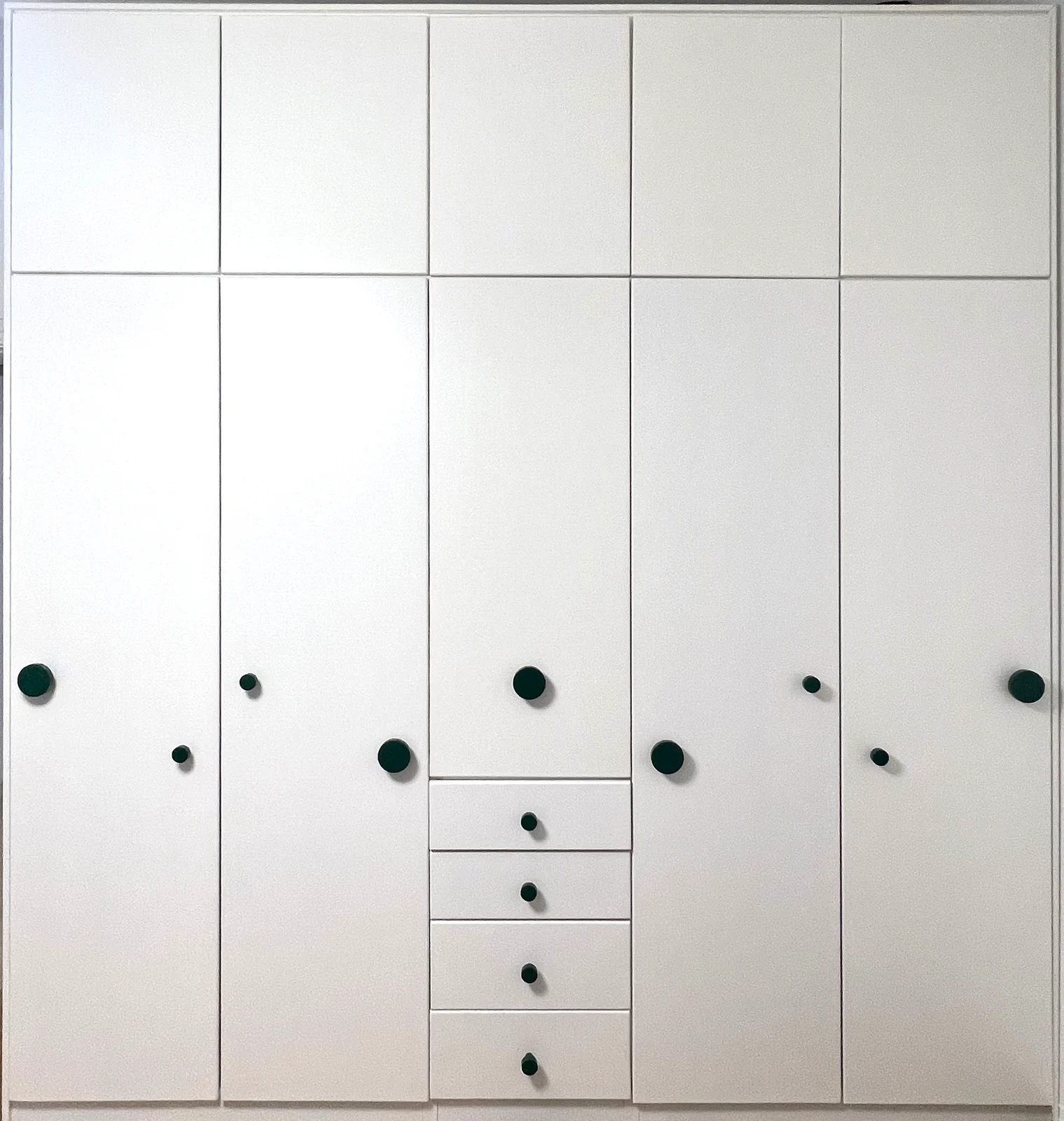 White wardrobe & green handles