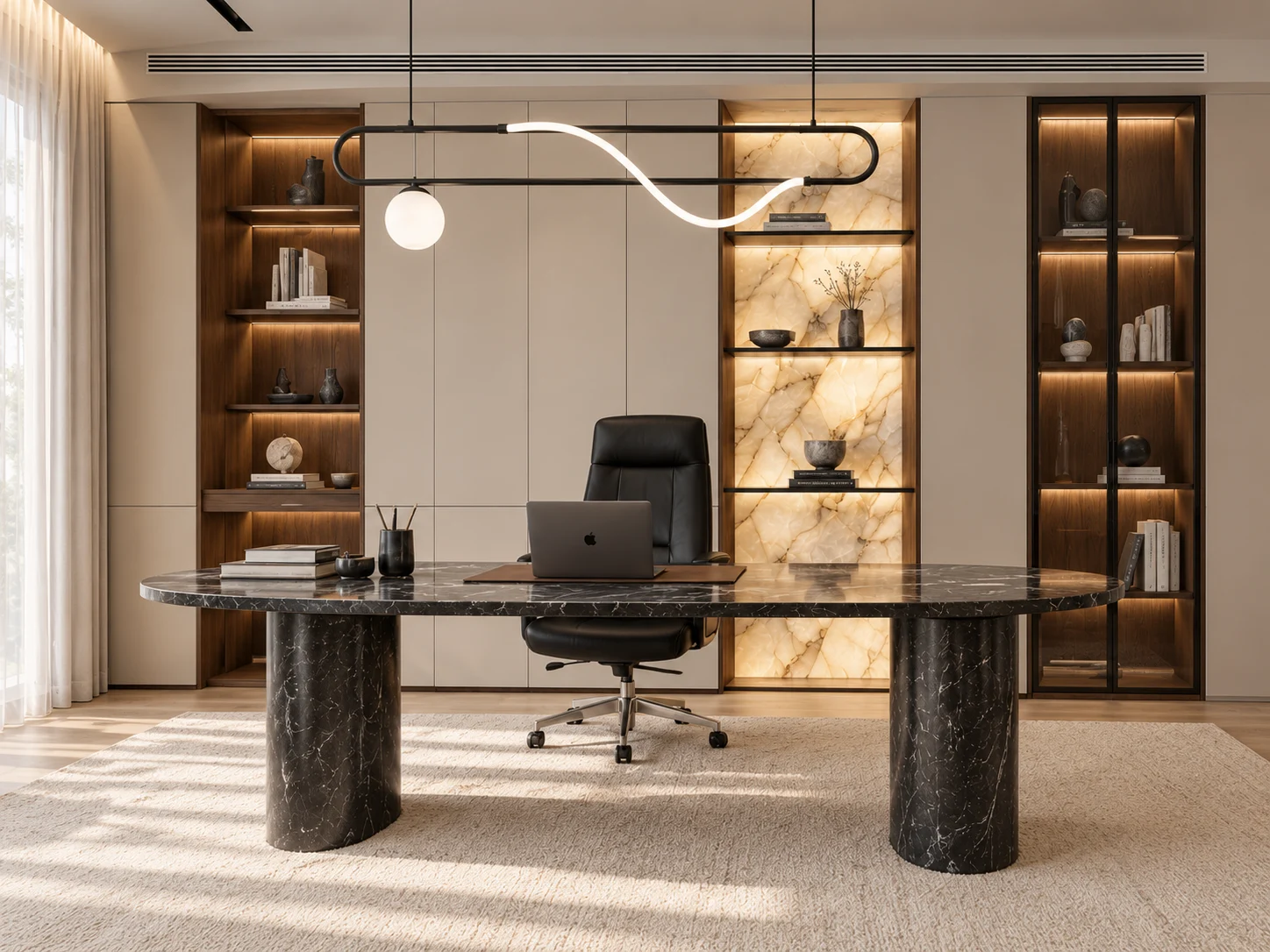 Dark stone desk beneath a curved pendant, backed by illuminated veined panels