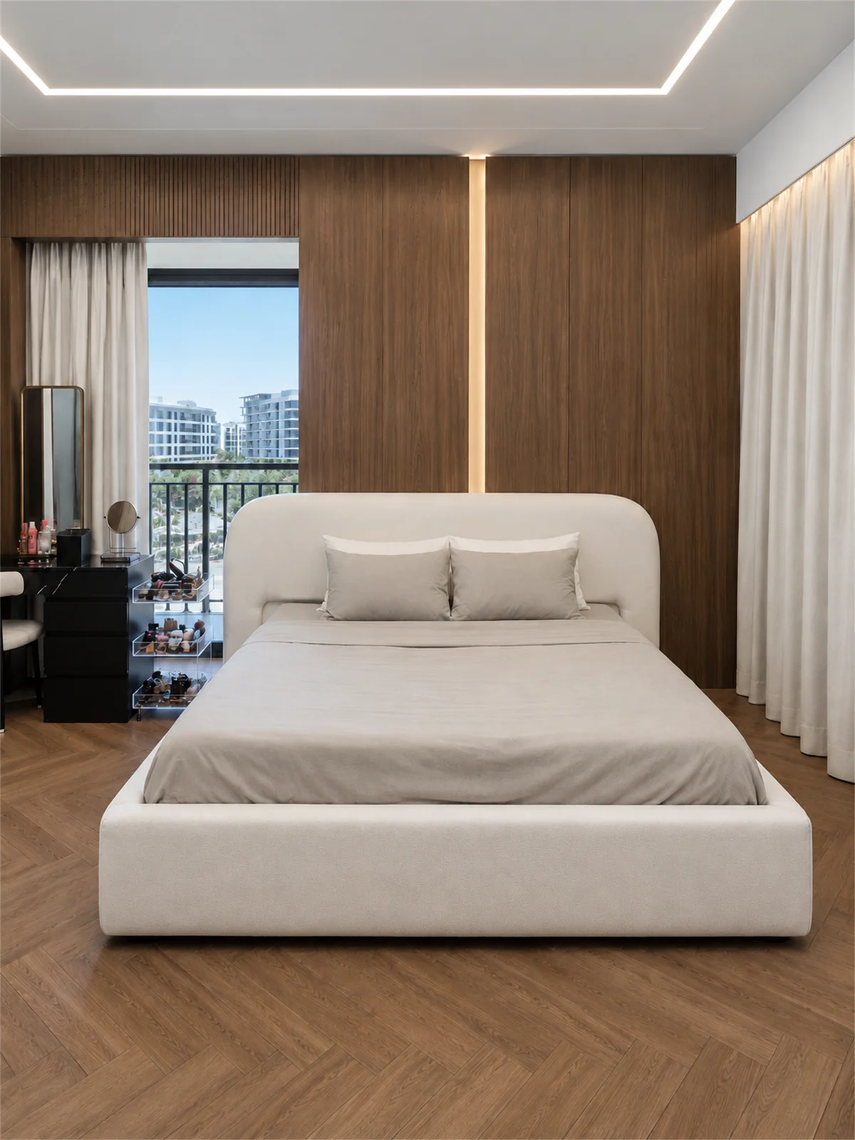 Bedroom with an upholstered bed & warm timber panelling