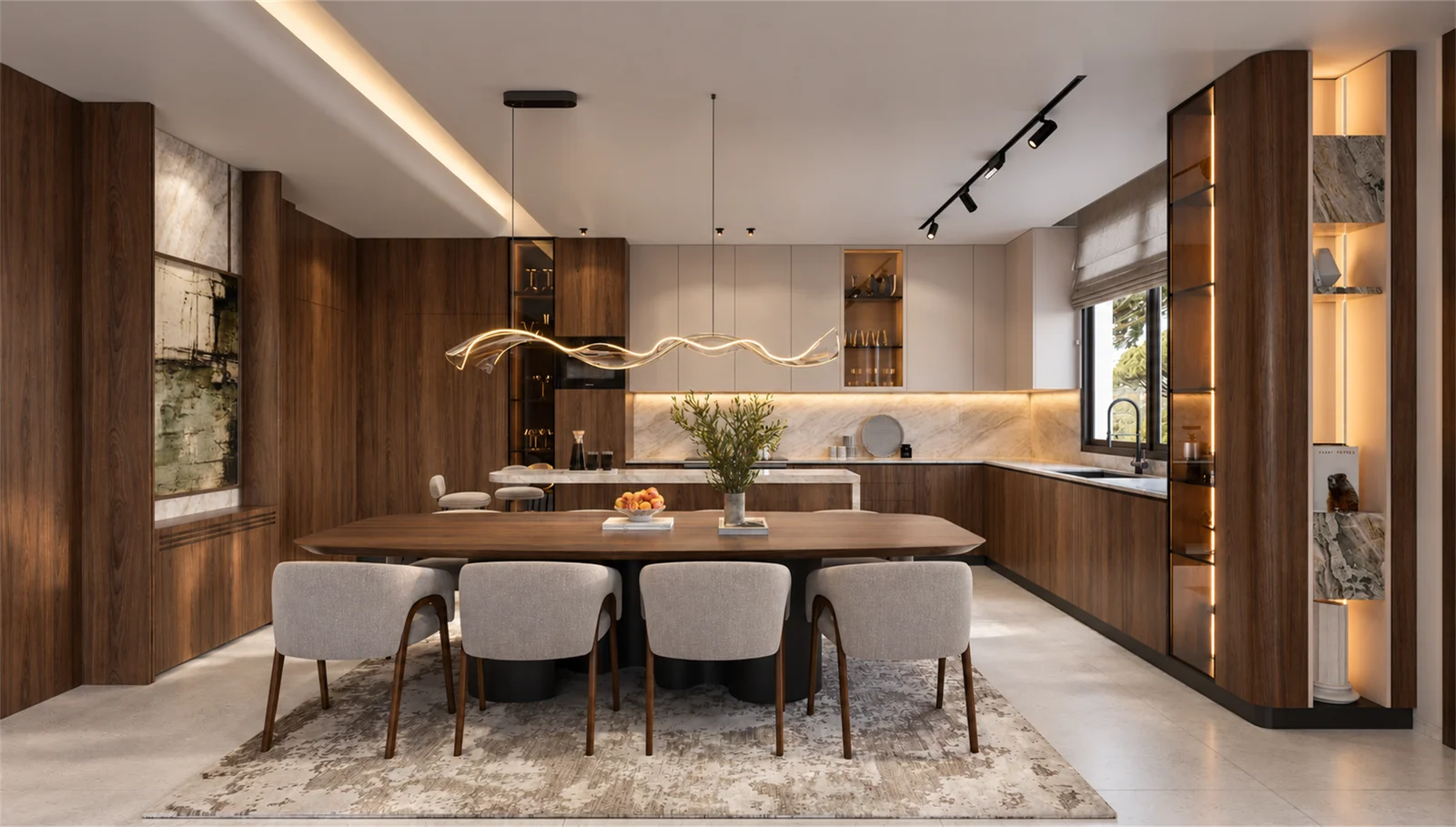 Dining table beneath a sculptural pendant, opening onto the timber kitchen