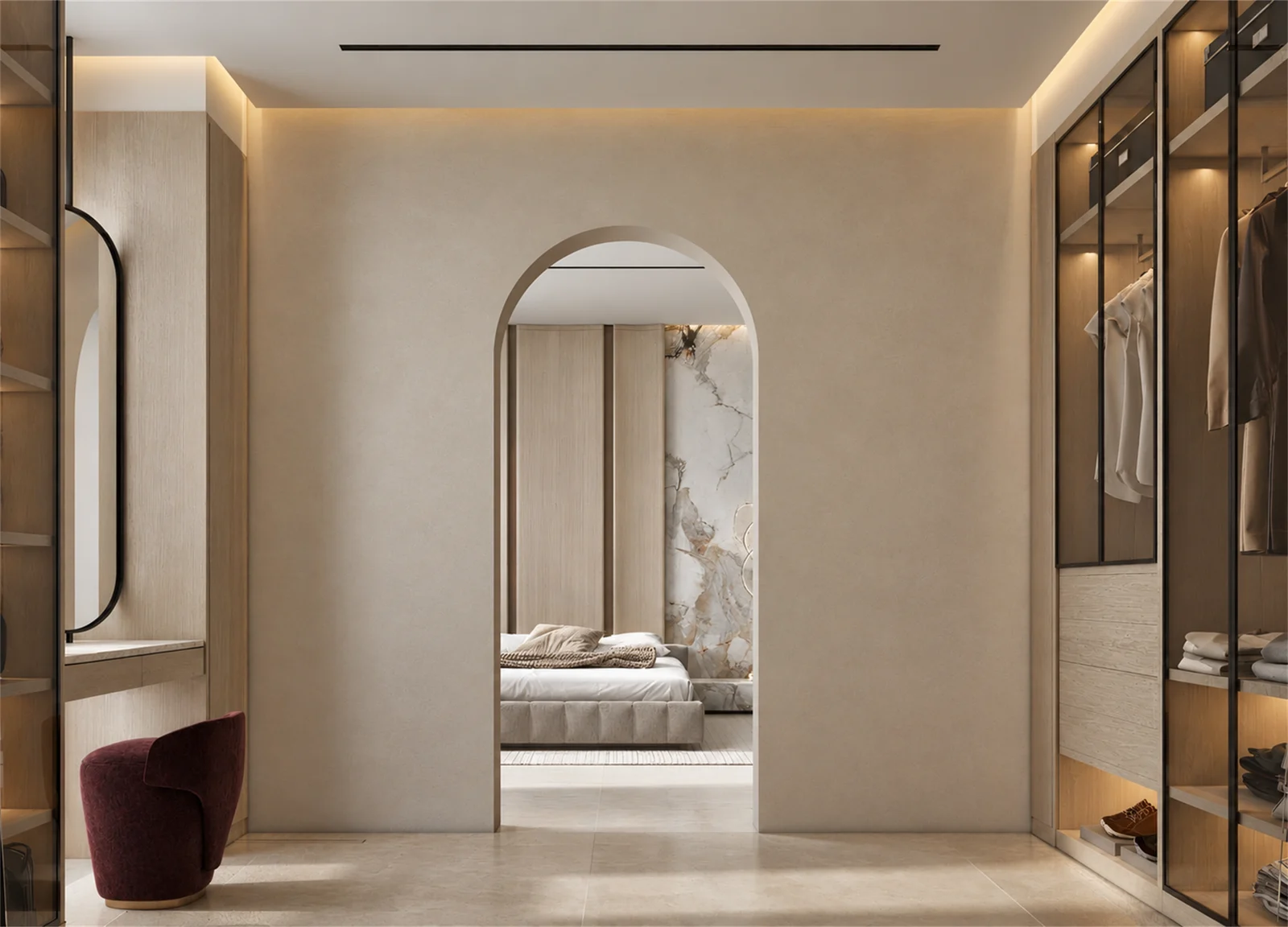 Arched doorway connecting dressing room & bedroom