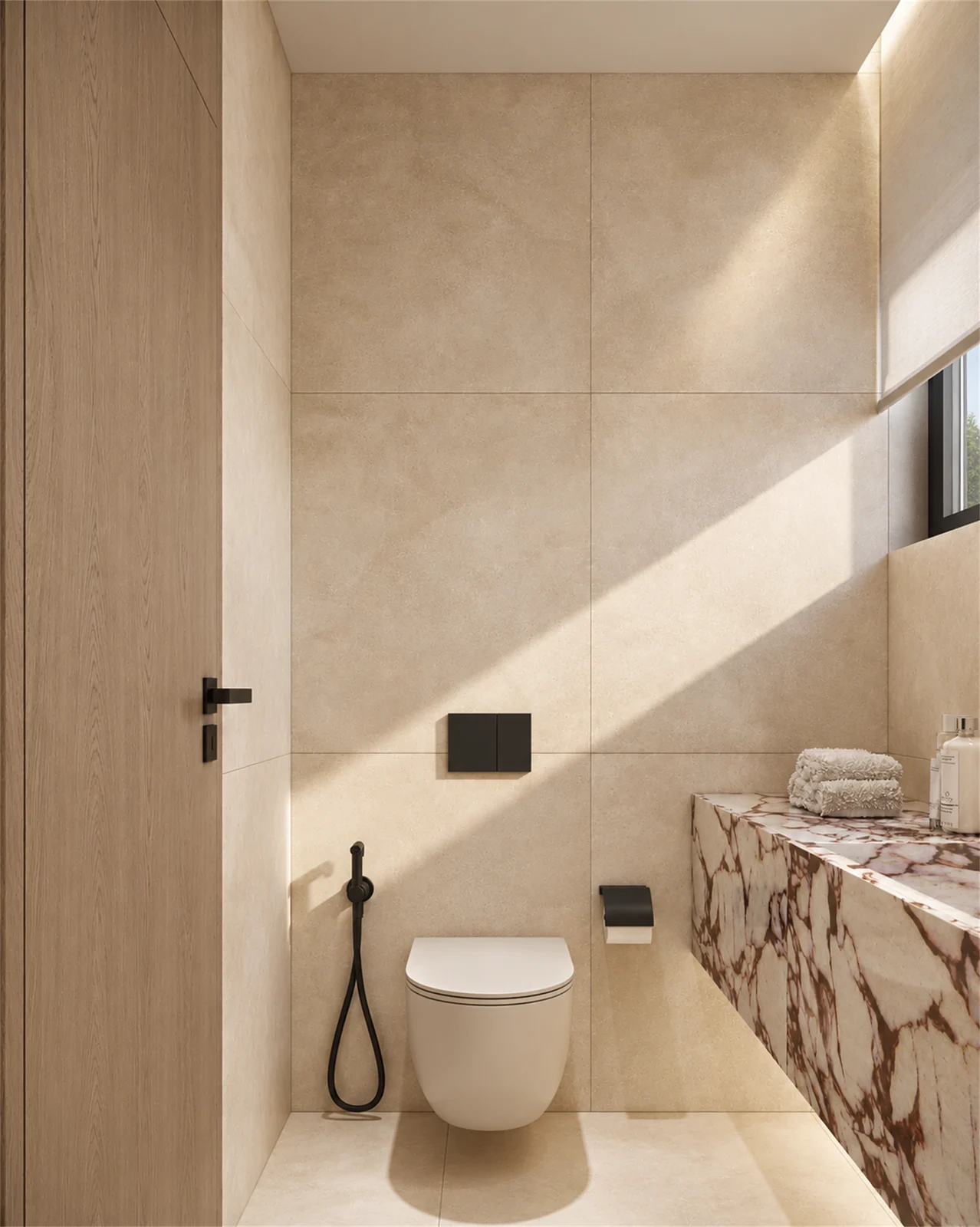 Majlis washroom with pale wall finishes & sculptural vanity