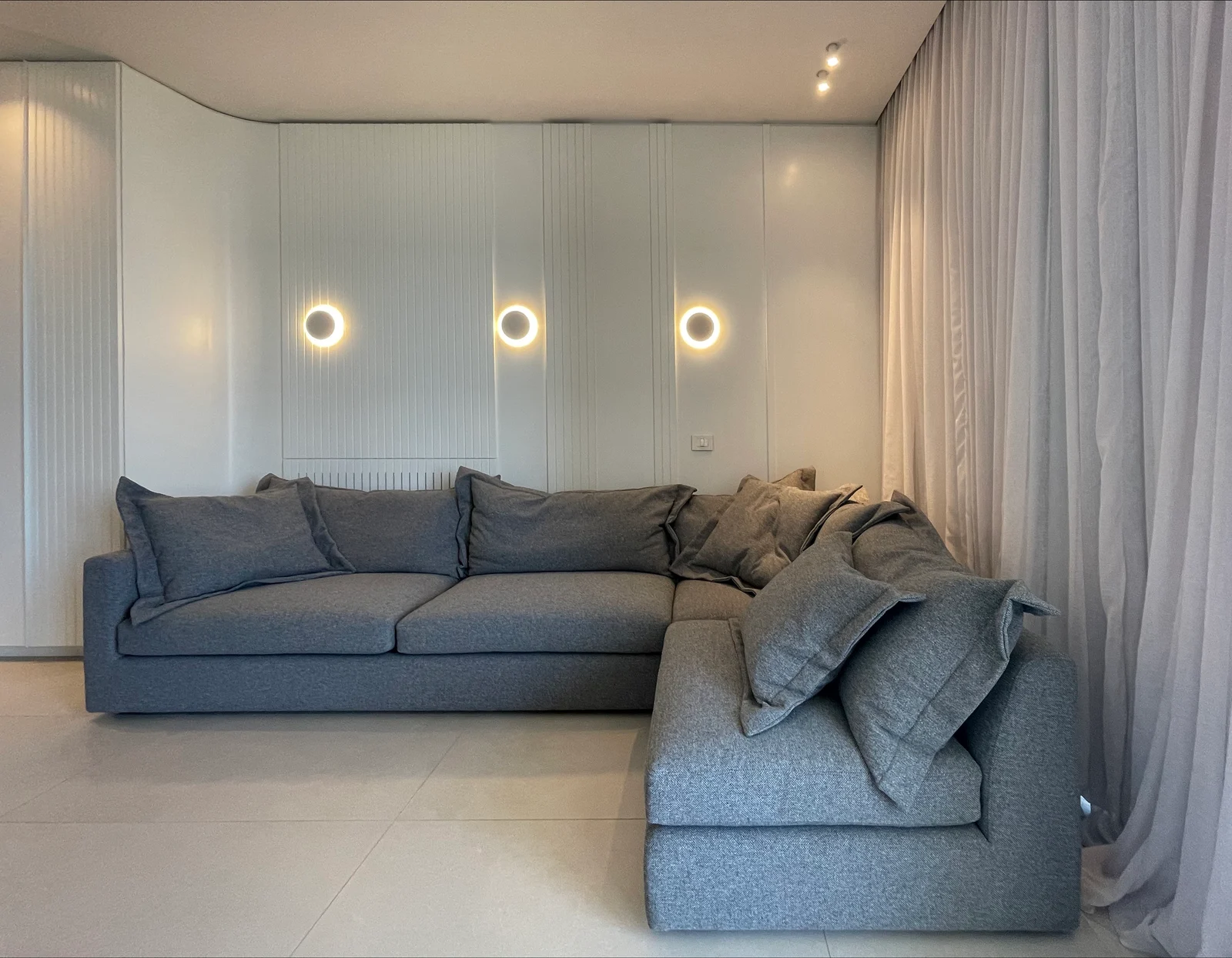 Lounge with circular wall lights