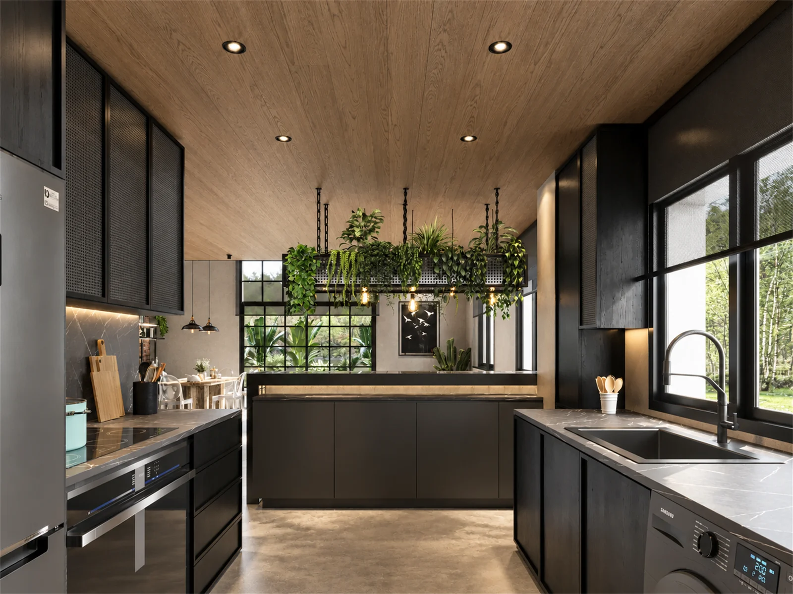 Kitchen with dark cabinetry, pale worktops and a window-side sink