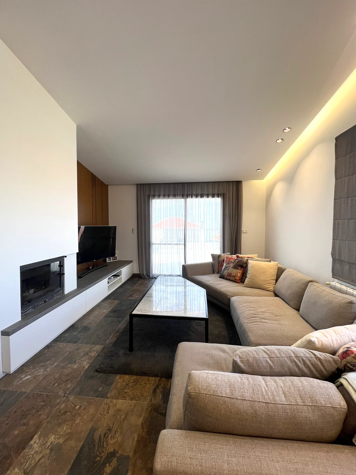 Lounge with fireplace & garden outlook